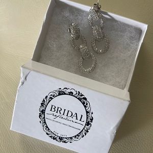 Earrings never worn, forgot to take with me on day of my daughters wedding